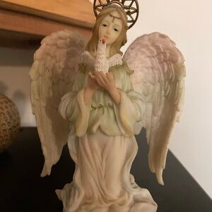 Christmas around the world Serena Angel holding dove Faith. 7” tall